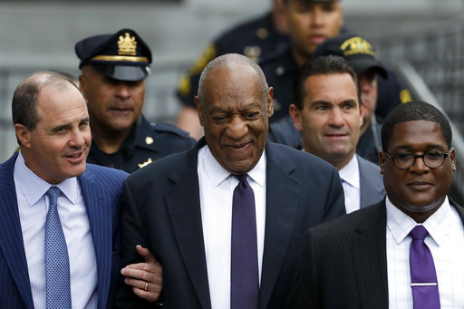 Bill Cosby walks from the Montgomery County Courthouse during his sexual assault trial