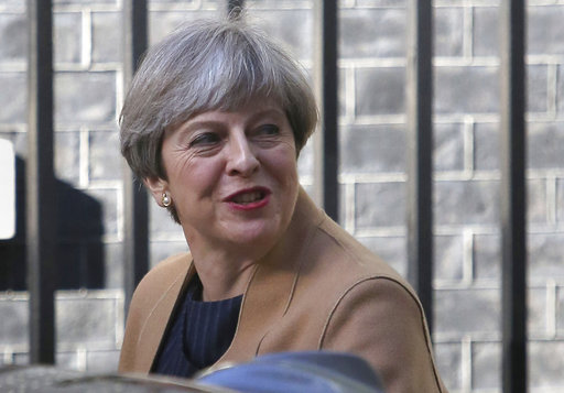 Prime Minister Theresa May leaves 10 Downing Street in London