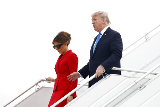 U.S. President Donald Trump and first lady Melania arrive on Air Force One at Orly Airport in Paris