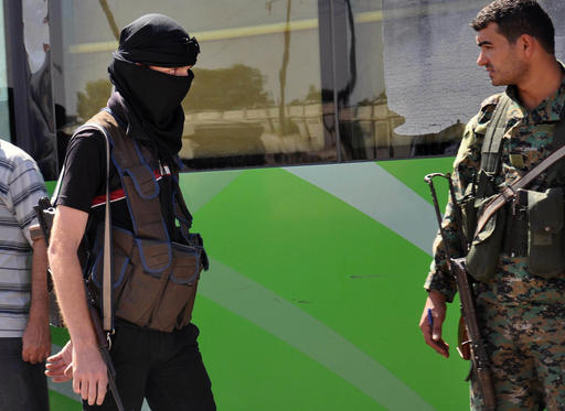 In this photo released by the Syrian official news agency SANA