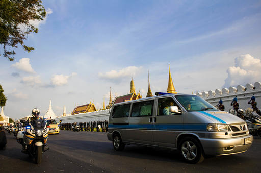 A van carrying the body of late Thai King Bhumibol Adulyadej leaves Siriraj Hospital for Grand Palace in a procession led by his son and heir apparent Crown Prince Vajiralongkorn in Bangkok