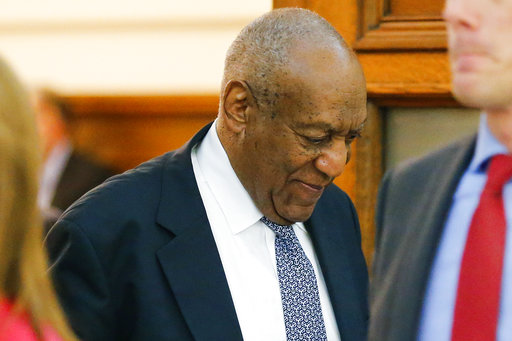 Actor Bill Cosby walks out of the courtroom during a break in his sexual assault trial at the Montgomery County Courthouse in Norristown
