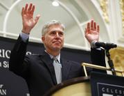 Supreme Court Justice Neil Gorsuch gestures as he acknowledges applause from the audience as he beings to speak at the 50th anniversary of the Fund for America Studies luncheon at the Trump Hotel in Washington