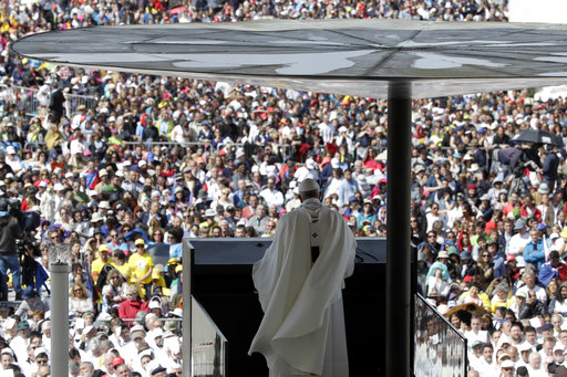 Pope Francis delivers his homily during a mass at the Sanctuary of Our Lady of Fatima Saturday