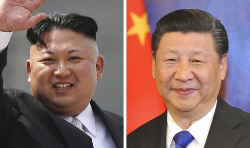 FILE - This combination of file photos shows North Korean leader Kim Jong Un