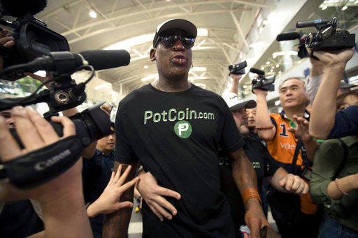 Former NBA basketball player Dennis Rodman arrives at Beijing Capital International Airport in Beijing