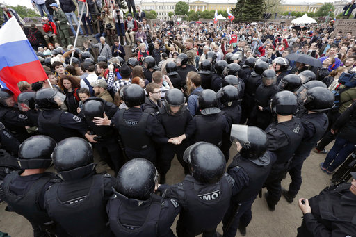 Police form a human chain during anti corruption rally in St.Petersburg