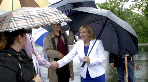 Republican gubernatorial candidate and New Jersey Lt. Gov. Kim Guadagno greets supporters outside the Church of the Precious Blood Parish Center before she cast her vote in the state's primary election