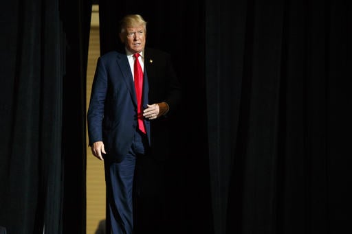 Republican presidential candidate Donald Trump arrives to speak at a campaign rally at the South Florida Fairgrounds and Convention Center