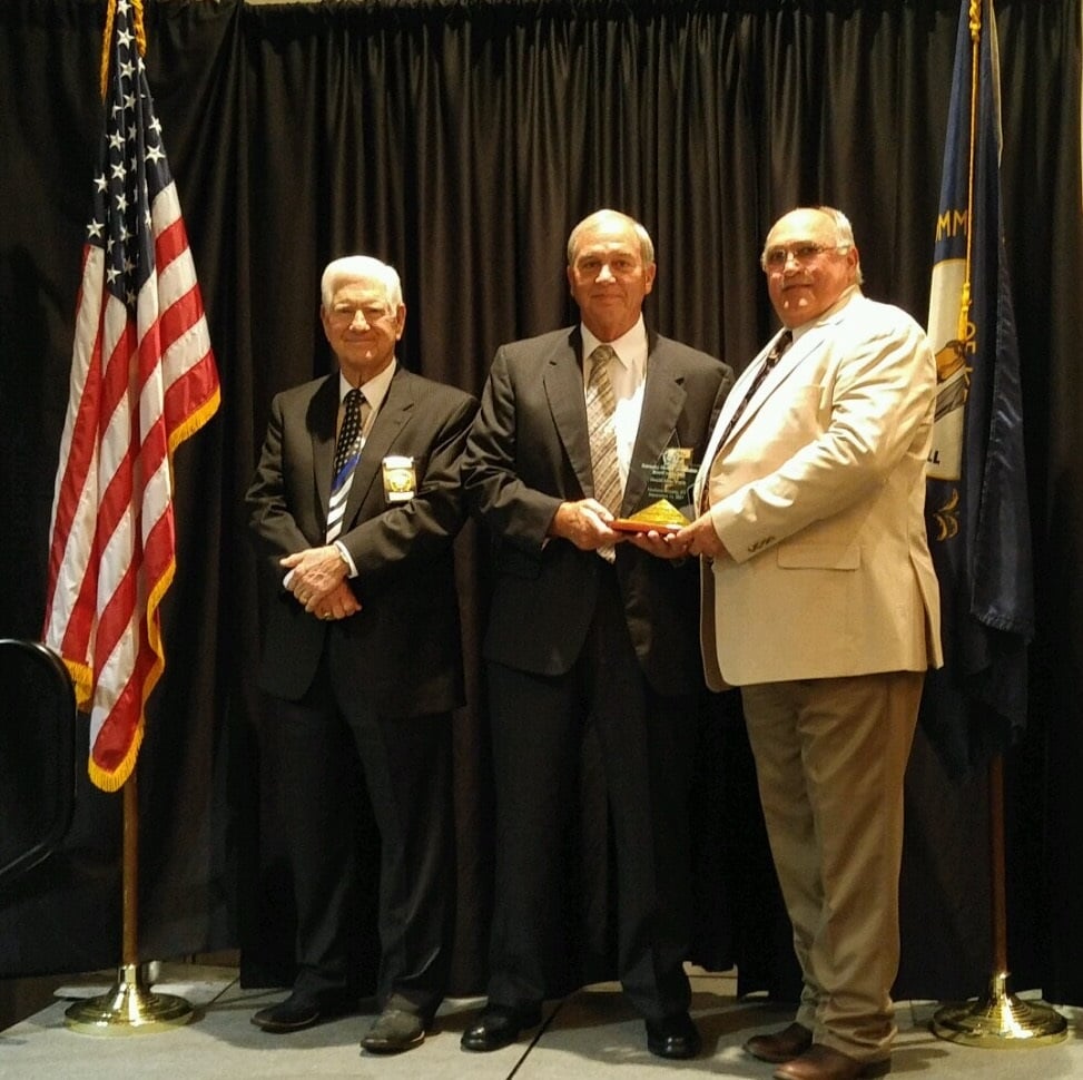 Madison County Sheriff Mike Coyle (center) receives KY Sheriff of the Year Award for 2017