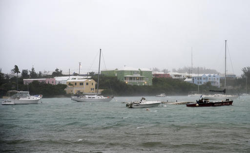 Heavy rain and increasing winds rock boats moored in Mullet Bay in St. Georges