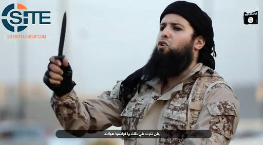 This image from video provided by the SITE Intelligence Group shows Rachid Kassim as he appeared on a video released on militant websites on July 20