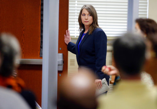 Tulsa Police Officer Betty Shelby enters the courtroom Monday