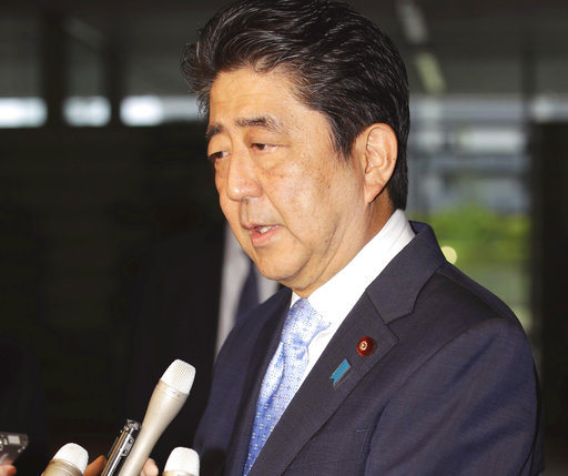 Japanese Prime Minister Shinzo Abe speaks to the media at the prime minister's official residence in Tokyo shortly after learning that North Korea conducted a missile launch test