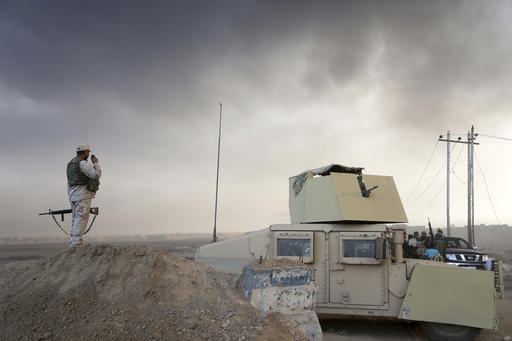 Smoke rises from Islamic state positions after an airstrike by coalition forces in Mosul