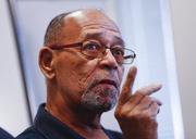 Phillip Butler speaks during a news conference at his attorney's office in Washington