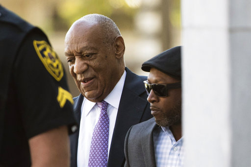 Bill Cosby arrives with Comedian Joe Torry