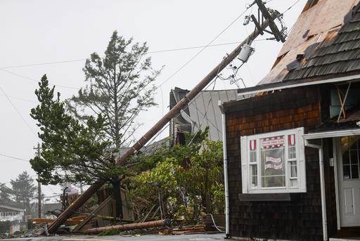 Storm debris lays along Laneda Ave