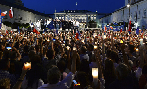 Opposition supporters protest in front of the presidential palace