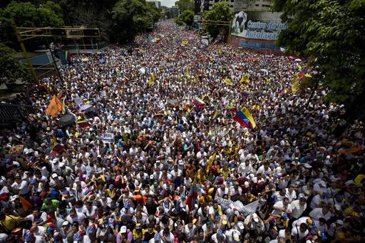 Demonstrators take part in the  "taking of Caracas" march in Caracas