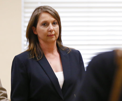 Betty Shelby leaves the courtroom following testimony in her trial in Tulsa