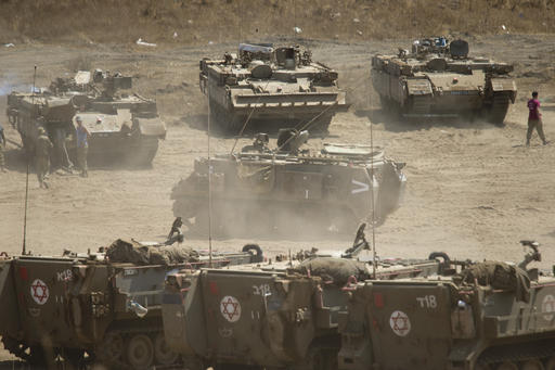 An Israeli military vehicle drives during training in the Israeli-controlled Golan Heights