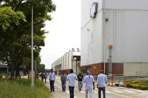 Worker walks at the General Motors' plant in Valencia