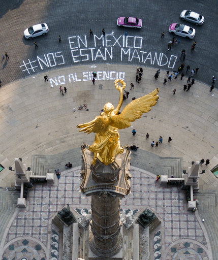 This photo released by Derecho a Informar shows a birds eye view of the Angel of Independence monument where a dozen reporters gathered to write