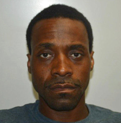 This undated photo provided by the Fresno Police Department shows Kori Ali Muhammad a suspect in the Fresno