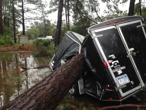 A trailer is destroyed from a fallen tree  in the aftermath of Hurricane Matthew at Hilton Head