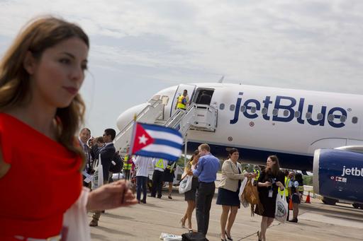 Passengers of JetBlue flight 387 arrives at the airport in Santa Clara