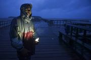 David Cruz Marrero watches the waves at Punta Santiago pier hours before the imminent impact of Maria