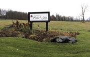 A sign marks the entrance to the Wake Robin retirement community