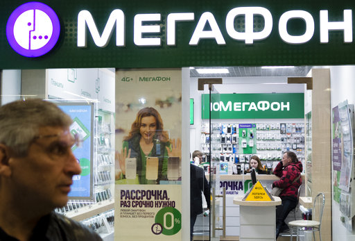 People inside a Megafon mobile phones shop in Moscow