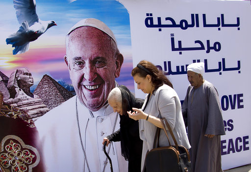 A billboard welcomes Pope Francis