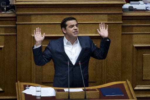 Greek Prime Minister Alexis Tsipras speaks during a Parliament session in Athens