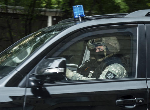 A police car leaves the district court in Dresden