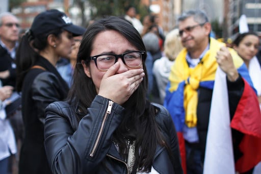 A supporter of the peace accord signed between the Colombian government and rebels of the Revolutionary Armed Forces of Colombia