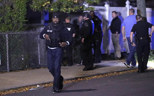 Police search for a suspect after a shooting in the East Boston neighborhood of Boston