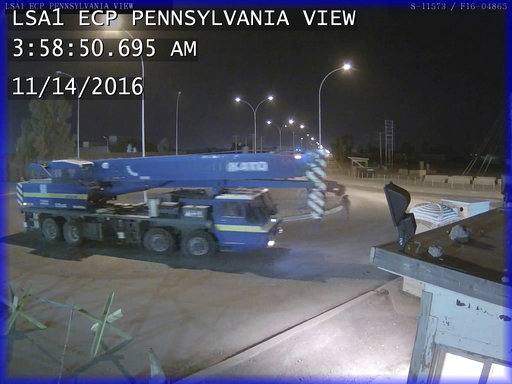 This photo obtained by The Associated Press shows security camera footage of a crane leaving Balad Air Base unchallenged by Sallyport Global security guards on Nov. 14