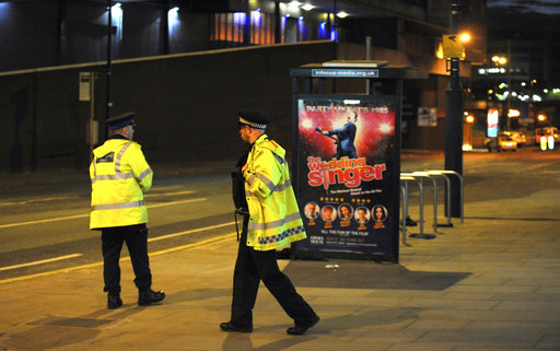 Police block a road near to the Manchester Arena in central Manchester
