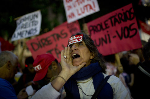 Demonstrators protest Brazil's President Michel Temer in Rio de Janeiro