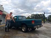 Paul Johnson points to the flood water line on his truck in the San Marco neighborhood in Jacksonville
