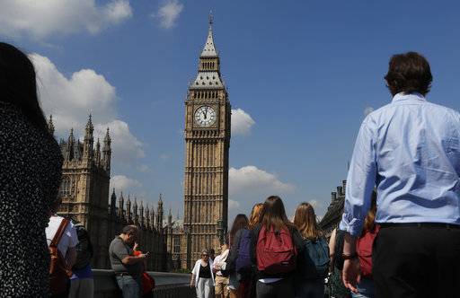 People observe a minutes silence in Westminster in London
