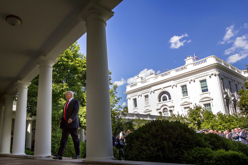 President Donald Trump walks to the Oval Office of the White House in Washington