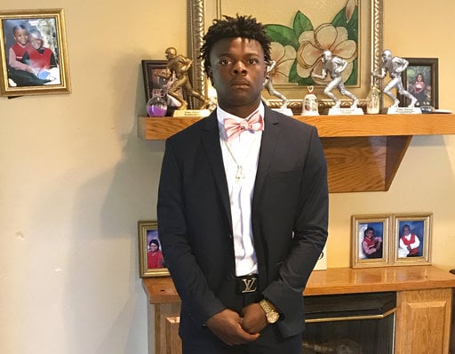 In this undated photo provided by Tiffany Blackwell her son Jordan Blackwell poses for a photo. Authorities say a gunman went on a house-to-house rampage on Saturday