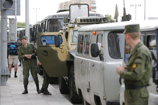 Russian Interior Ministry buses and cars are parked along the Tverskaya street in downtown Moscow