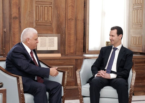 In this photo released by the Syrian official news agency SANA