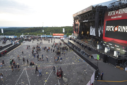 Visitors leave the music festival Rock am Ring outside the western town of Nuerburg