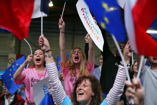 Supporters cheer during a campaign rally for independent centrist presidential candidate Emmanuel Macron
